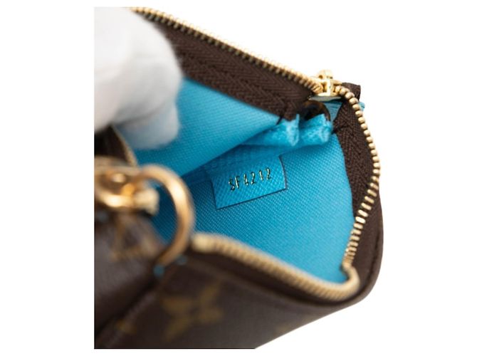 Louis Vuitton Monogram Vivienne Mini Pochette Accessoires Castaño Azul Multicolor - vista 5
