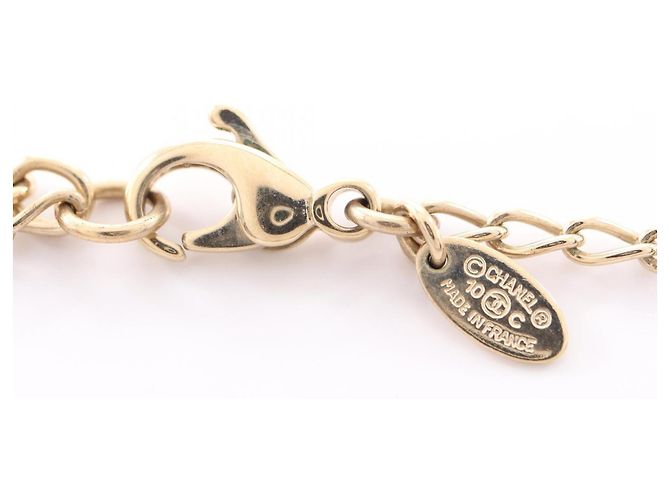 Conjunto de Colar e Brincos Chanel 10C Coco Mark Preto Dourado - vista 3