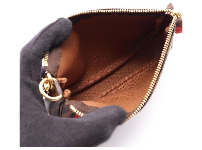 Borsa Louis Vuitton Mini Pochette Accessoires Damier Ebene Illustré Marrone Multicolore - vista 3