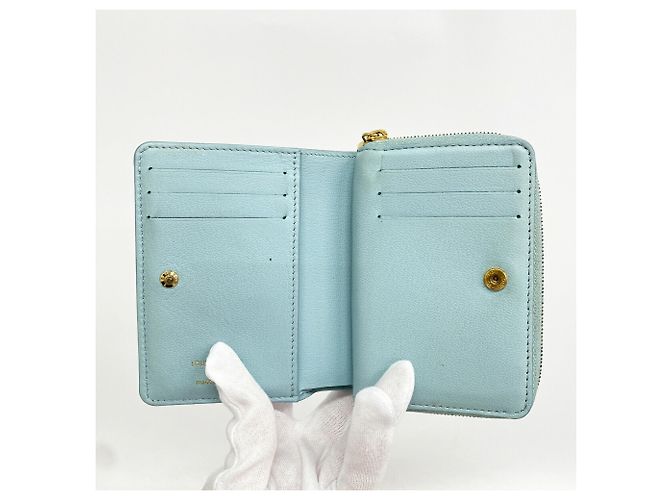 Louis Vuitton Monogram Embossed Portefeuille Lou Wallet Blu - vista 3