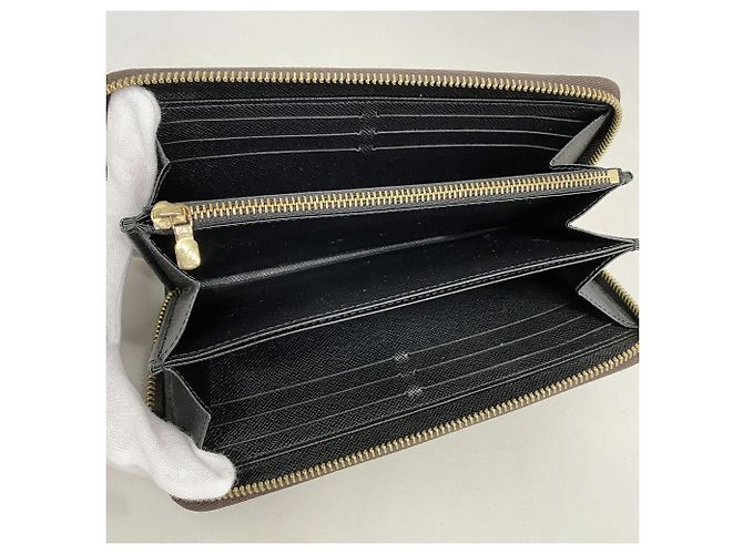 Louis Vuitton Monogram Reverse Zippy Wallet M82444 Castaño - vista 3