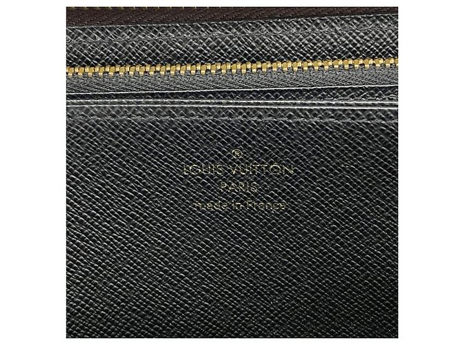 Louis Vuitton Monogram Reverse Zippy Wallet M82444 Castaño - vista 4