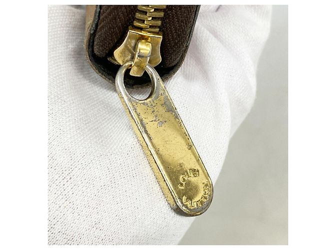Louis Vuitton Monogram Reverse Zippy Wallet M82444 Castaño - vista 7
