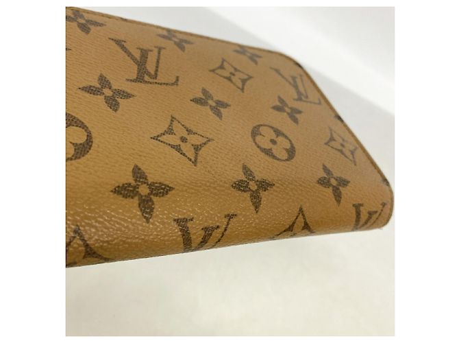 Louis Vuitton Monogram Reverse Zippy Wallet M82444 Castaño - vista 8