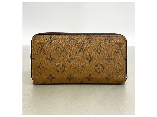 Louis Vuitton Monogram Reverse Zippy Wallet M82444 Castaño - vista 9