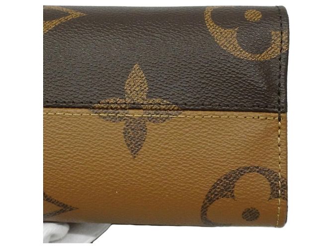 Louis Vuitton Monogram Giant Reverse OnTheGo PM Handtasche Braun - Ansicht 10