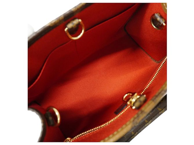 Louis Vuitton Monogram Giant Reverse OnTheGo PM Handtasche Braun - Ansicht 4