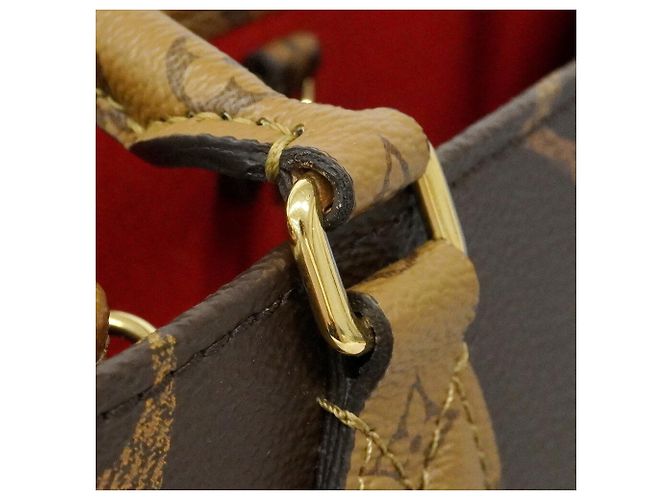 Louis Vuitton Monogram Giant Reverse OnTheGo PM Handtasche Braun - Ansicht 7