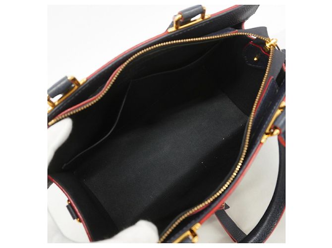 Bolsa Louis Vuitton Monogram Empreinte Three PM Vermelho - vista 4