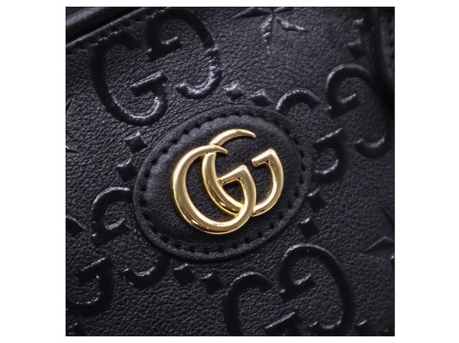 Gucci GG Embossed Star Handtasche Medium Braun Beige - Ansicht 16