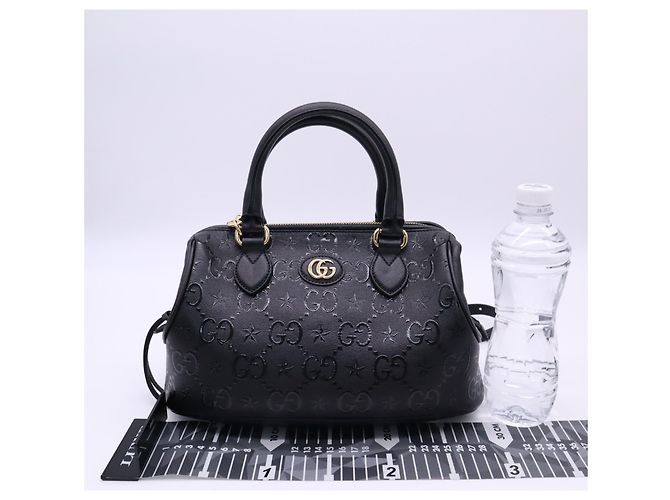 Gucci GG Embossed Star Handtasche Medium Braun Beige - Ansicht 3