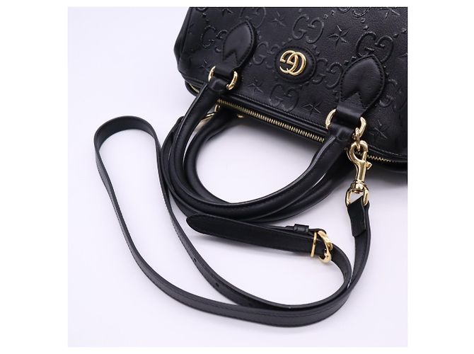 Gucci GG Embossed Star Handtasche Medium Braun Beige - Ansicht 9