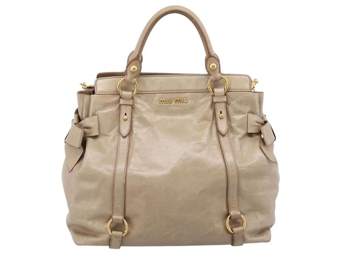 Borsa a mano Miu Miu con fiocco laterale in pelle 2way Beige Gold RN0939 Auth am12577V D'oro - vista 2