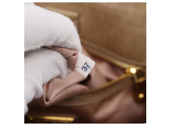 Borsa a mano Miu Miu con fiocco laterale in pelle 2way Beige Gold RN0939 Auth am12577V D'oro - vista 24