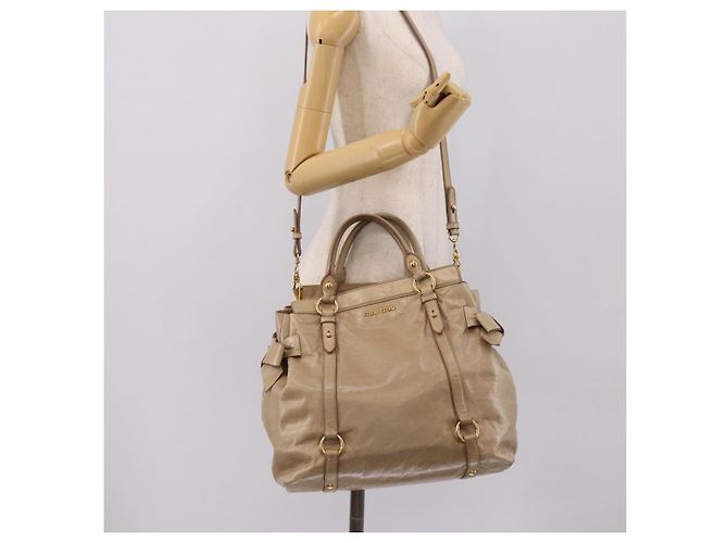 Borsa a mano Miu Miu con fiocco laterale in pelle 2way Beige Gold RN0939 Auth am12577V D'oro - vista 25