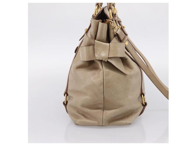 Borsa a mano Miu Miu con fiocco laterale in pelle 2way Beige Gold RN0939 Auth am12577V D'oro - vista 4
