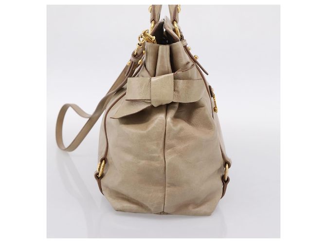 Borsa a mano Miu Miu con fiocco laterale in pelle 2way Beige Gold RN0939 Auth am12577V D'oro - vista 5