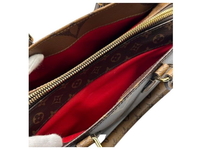 Bolso Louis Vuitton OnTheGo EW Monogram Castaño - vista 6