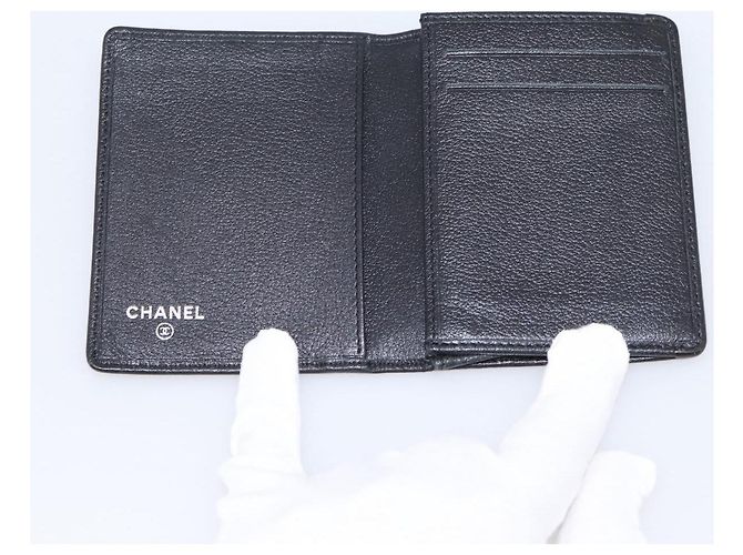 CHANEL Tarjetero Camelia en piel de becerro negro CC Auth 203316A - vista 14
