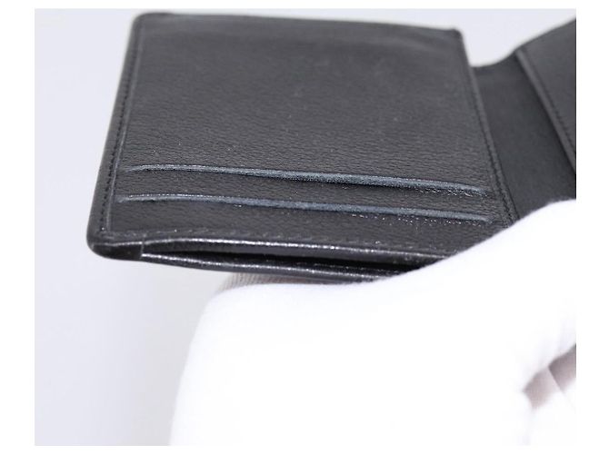 CHANEL Tarjetero Camelia en piel de becerro negro CC Auth 203316A - vista 16