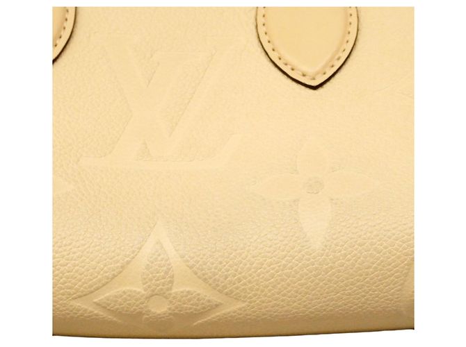 Borsa Louis Vuitton Monogram Empreinte OnTheGo EW Crudo - vista 10