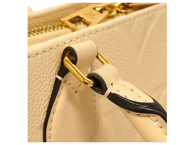 Borsa Louis Vuitton Monogram Empreinte OnTheGo EW Crudo - vista 12