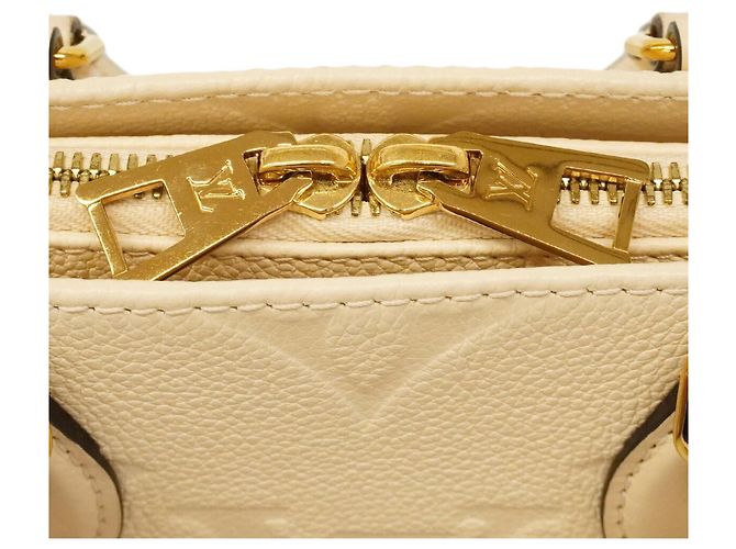 Borsa Louis Vuitton Monogram Empreinte OnTheGo EW Crudo - vista 15