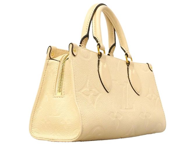 Borsa Louis Vuitton Monogram Empreinte OnTheGo EW Crudo - vista 2