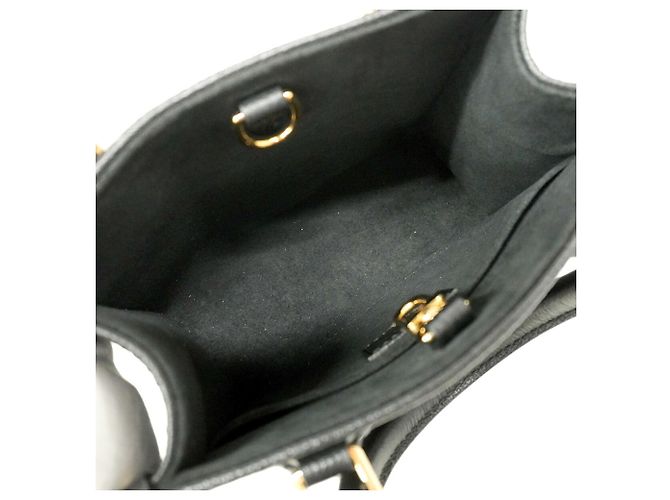 Bolso Louis Vuitton Monogram Empreinte OnTheGo BB Negro - vista 4