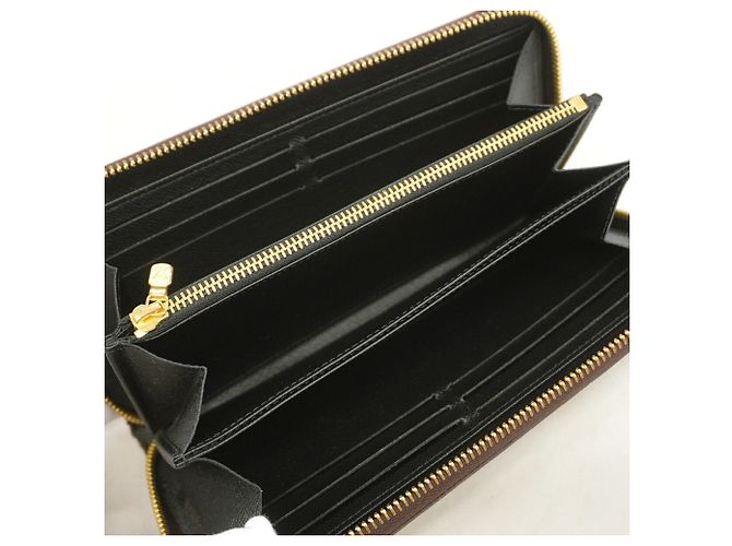 Cartera Zippy Monogram Reverse Louis Vuitton Castaño - vista 4