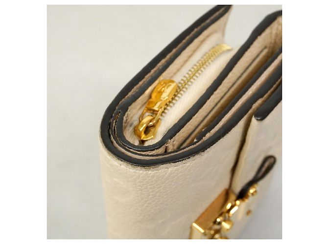 Louis Vuitton Tri-fold Wallet in Cream - view 6