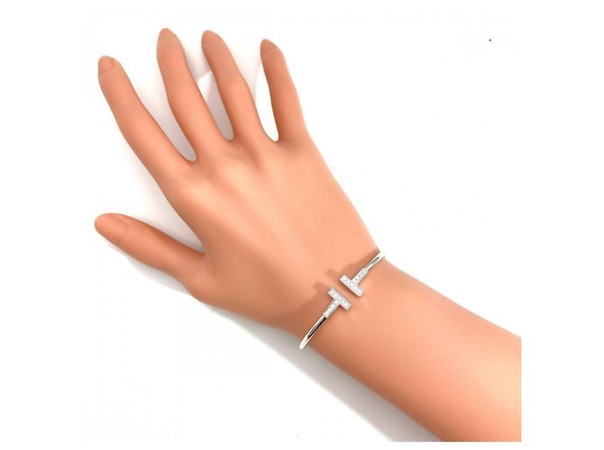 Autre Marque Bracciale Tiffany & Co. Diamond T Wire D'oro - vista 8