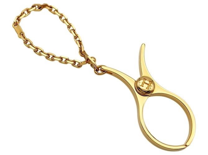 Hermès Portaluvas Hermes Philou Dorado - vista 2
