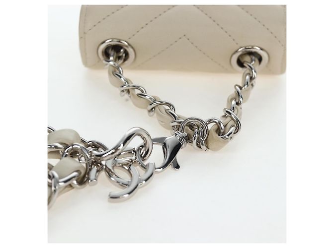 Borsa CHANEL Classic Mini Chain Bag V-stitch in pelle d'agnello Beige Argento CC Auth bs36939M - vista 7