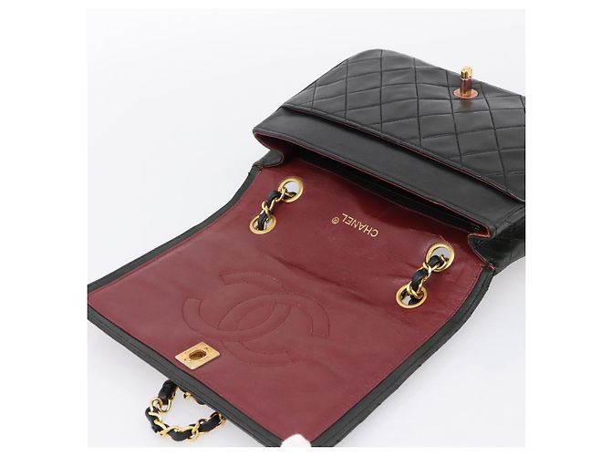 Borsa a tracolla CHANEL Matelasse con catena in pelle d'agnello nera e oro CC Auth 202897V Nero D'oro - vista 10