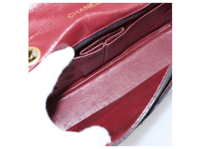 Borsa a tracolla CHANEL Matelasse con catena in pelle d'agnello nera e oro CC Auth 202897V Nero D'oro - vista 11