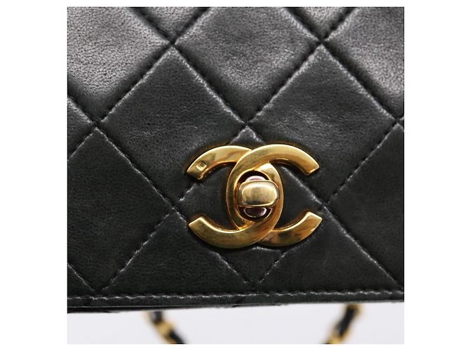 Borsa a tracolla CHANEL Matelasse con catena in pelle d'agnello nera e oro CC Auth 202897V Nero D'oro - vista 17