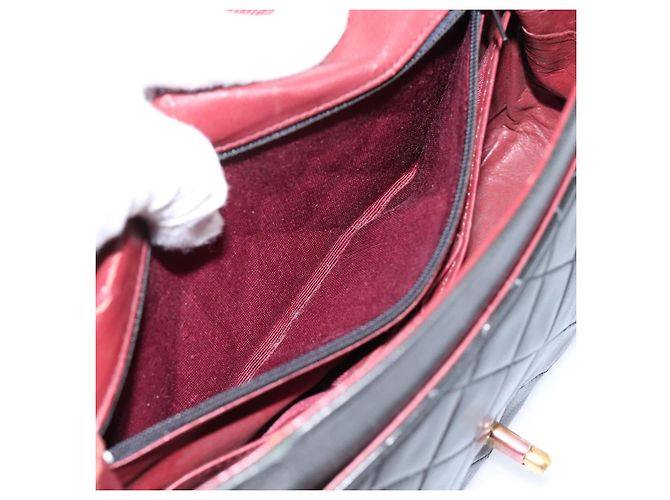 Borsa a tracolla CHANEL Matelasse con catena in pelle d'agnello nera e oro CC Auth 202897V Nero D'oro - vista 22