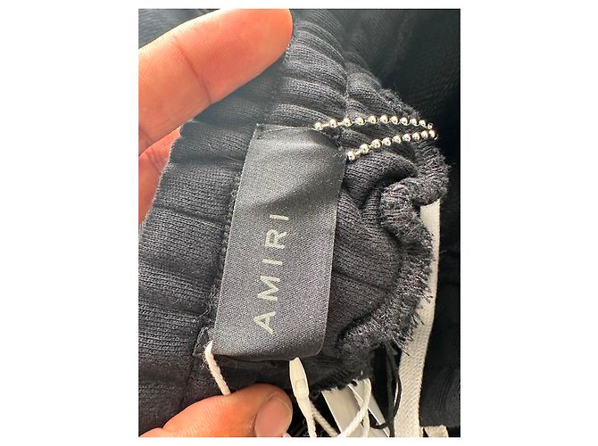 Pantaloni jogger Amiri con logo stencil stampato in cotone nero - vista 8