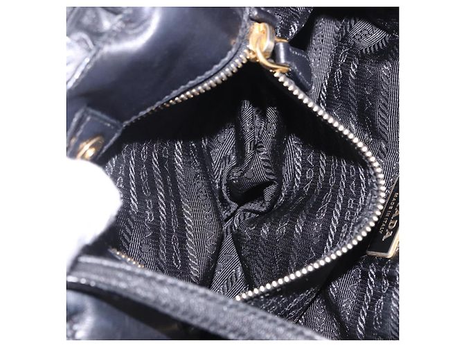 Borsa a mano PRADA Ribbon in pelle nera e oro Auth 202973V Nero D'oro - vista 27