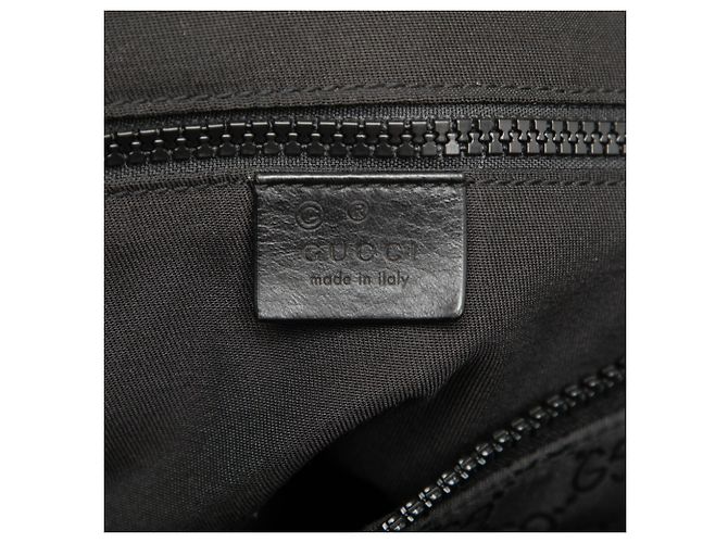 Borsa Duffle Gucci XL GG in nylon nero con banda Web - vista 5