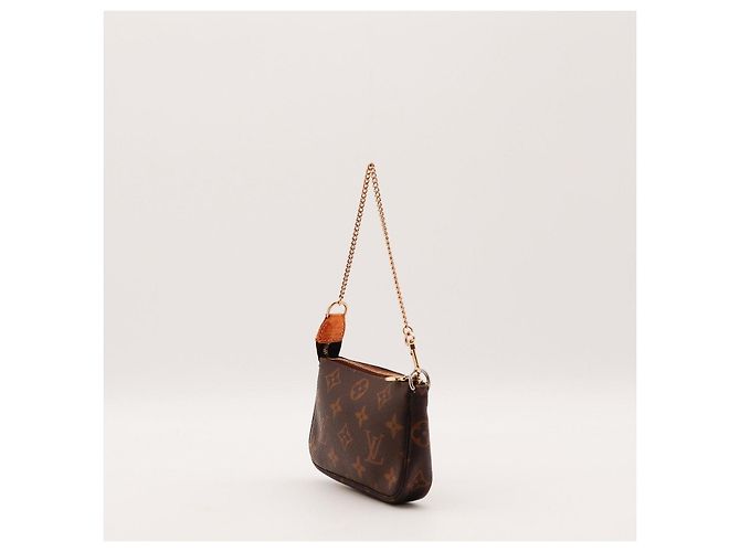 Bolsa Pochette Accessoires em canvas Monogram Louis Vuitton Marrom Monograma - vista 2