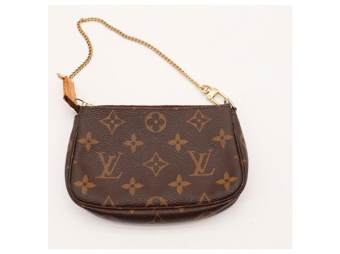 Bolsa Pochette Accessoires em canvas Monogram Louis Vuitton Marrom Monograma - vista 6
