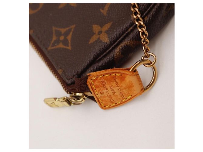 Bolsa Pochette Accessoires em canvas Monogram Louis Vuitton Marrom Monograma - vista 7