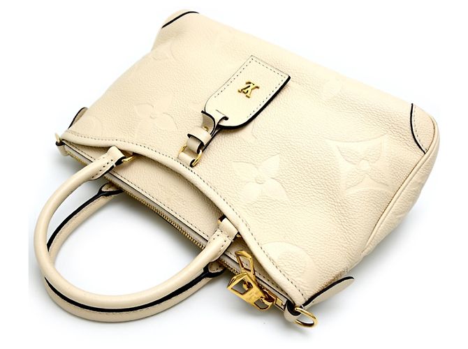 Bolsa Louis Vuitton Trianon PM Cru - vista 3