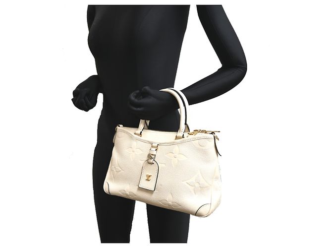 Bolsa Louis Vuitton Trianon PM Cru - vista 9
