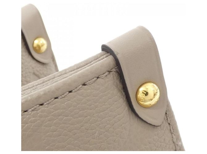 Bolso Louis Vuitton Monogram Empreinte OnTheGo MM Gris - vista 3
