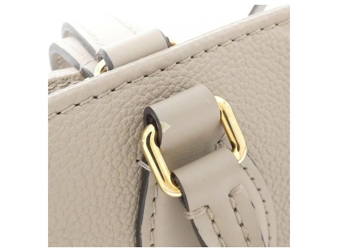 Bolso Louis Vuitton Monogram Empreinte OnTheGo MM Gris - vista 4