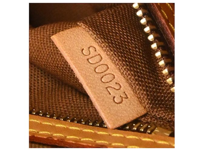 Louis Vuitton Trotteur Monogram Canvas Marron - vue 5
