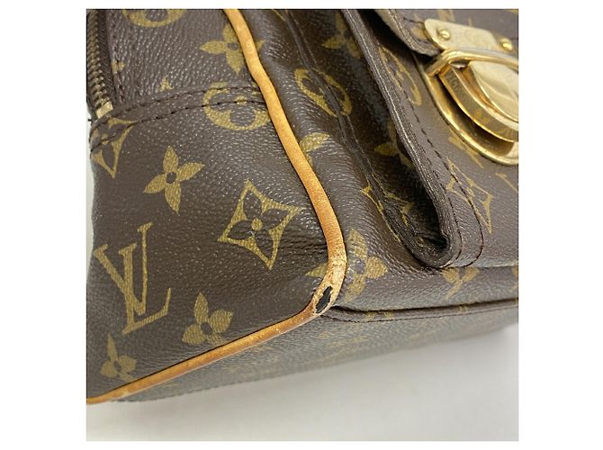 Bolso Louis Vuitton Monogram Manhattan PM Castaño - vista 6